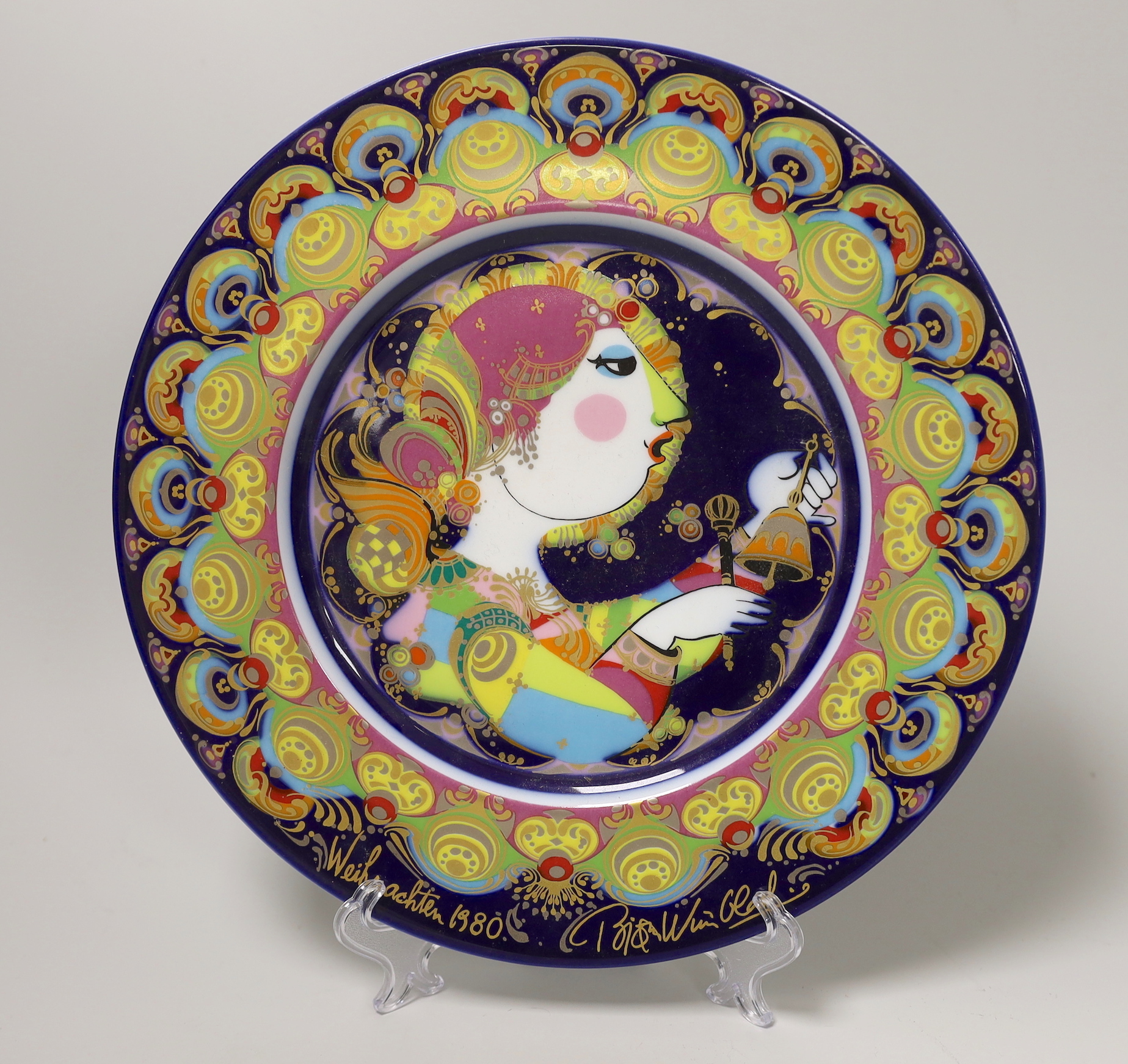 A Cauldon plate painted with blue tits on toadstools and a butterfly on another, signed R. Barratt, Derby, made for Burley & Co. Chicago, a Rosenthal limited edition plate Weihnachtsteller 1980, and an art pottery dish